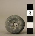 Earthen spindle whorl