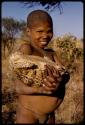 Boy holding a turtle