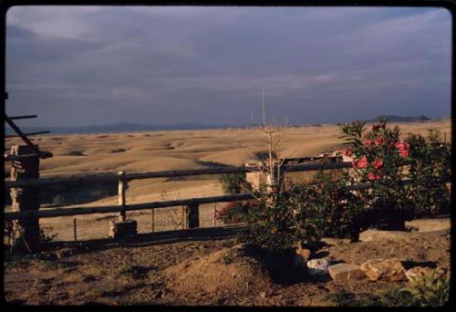 Fence, hilly landscape in the background