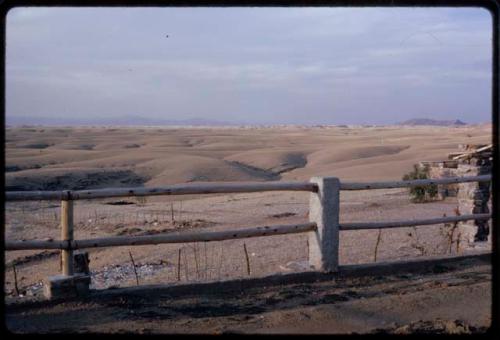 Fence, hilly landscape in the background