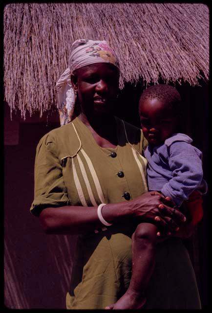 Kernel Ledimo's wife holding a child