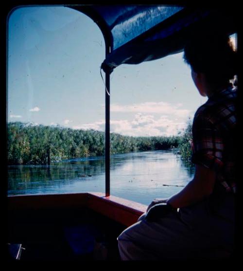 Expedition: Elizabeth Marshall Thomas sitting in a barge on the Kavango River