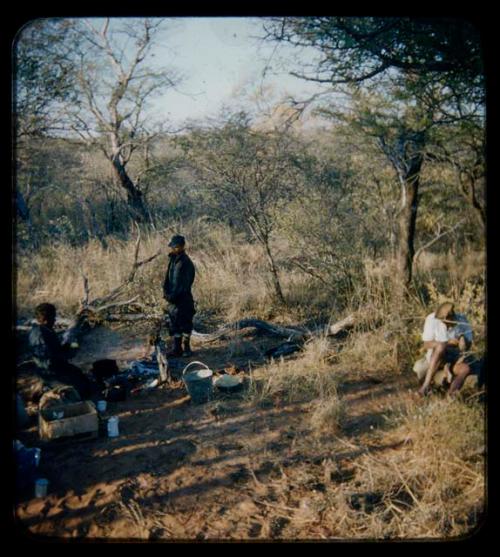 Expedition: Philip Hameva cooking, with Ngani watching him