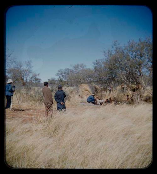 Expedition: Lorna Marshall photographing, with John Marshall and other expedition members present