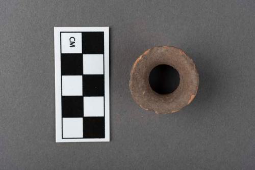 Pottery ear spool?