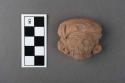 Pottery, human head, ear ornament