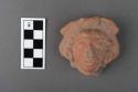 Pottery, human head, ear ornament