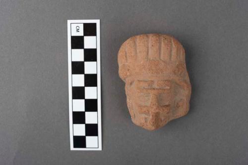 Pottery, human head, ear ornament