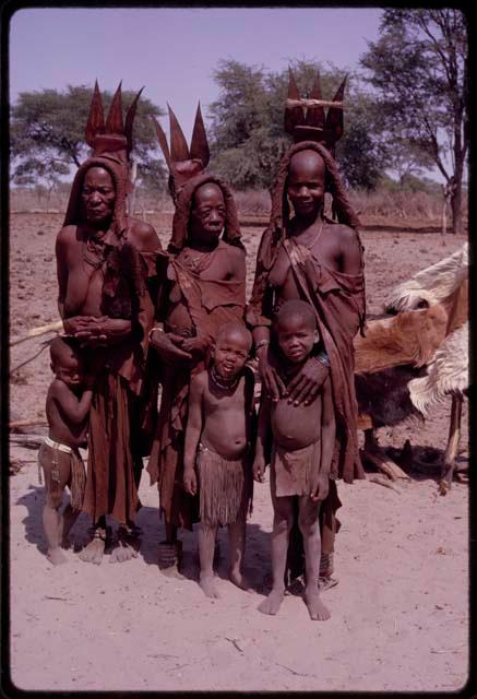 The two women and a girl, all in the ancient Herero dress