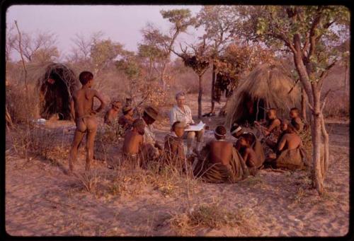 Lorna Marshall and Wilhelm Camm interviewing a group of people