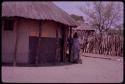 Kerwaletse (Segosebe's first wife) standing by her house