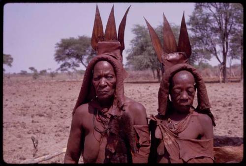 Wareka (wife of Berani) and Kavenavo (wife of Dauku) wearing pre-colonial (“traditional”) Herero dress