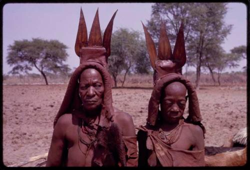 Wareka (wife of Berani) and Kavenavo (wife of Dauku) wearing pre-colonial (“traditional”) Herero dress