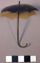 Miniature blue metal umbrella for doll called egego - used in ceremony+
