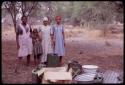 Three women and a girl who did laundry for the expedition