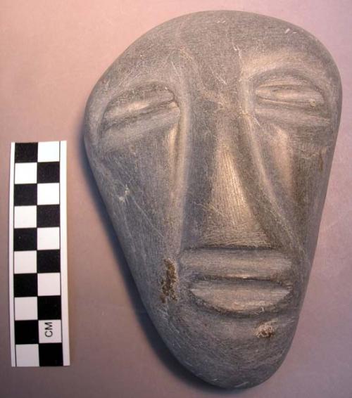 Stone carving - human head (light grey)