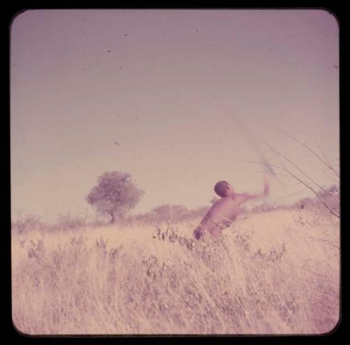 Spear: Man throwing an assegai, profile