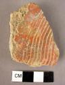 Reserved slip potsherd