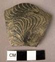 Potsherd - decorated with shell impressions