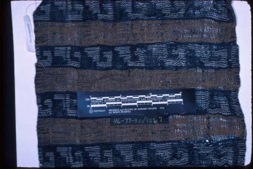 Textile, warp-patterned