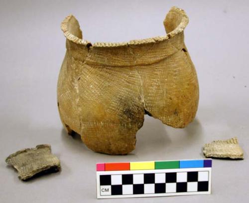 Ceramic partial vessel, mended, dentate, two sherds