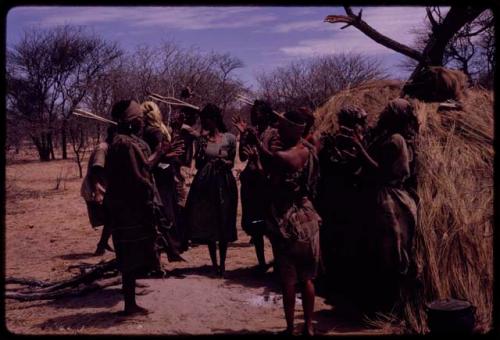 Group of women clapping and singing