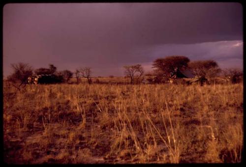 Expedition camp under a cloudy sky, distant view