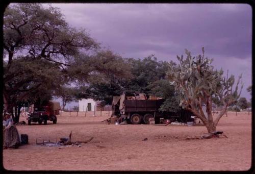 Trucks and cooking fire in expedition camp