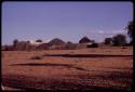 Huts and brush fence of Boy Moapane, brother of the Kgalagari chief, distant view