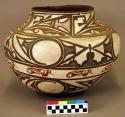 Large polychrome pottery vessel - black, red, and white geometric and bird desig
