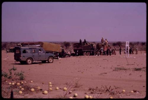 Inspectors examining expedition trucks before they can pass through a cattle barrier at the Mabeleapodi gate, a hoof and mouth disease prevention measure