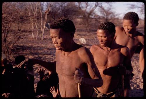 /Xoxa, /Gaishay, and Tama performing a curing dance, close-up