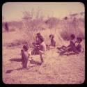 Group of boys sitting in the grass