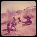 Group of boys sitting in the grass