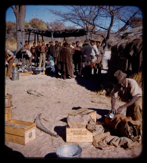 Group of people gathered at the expedition campsite