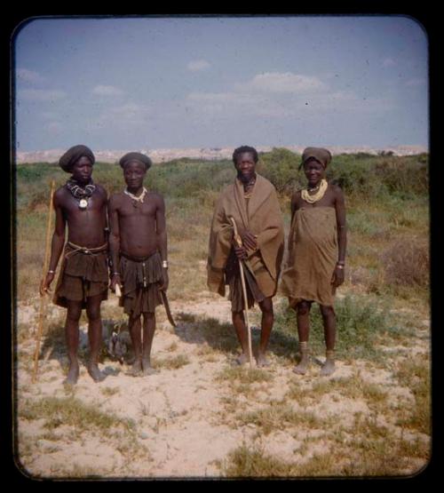 Group of people standing in a row at the Curoca Valley