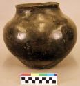 Pottery olla. Globular in shape, short neck, polished black ware