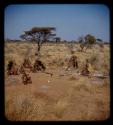 Group of people in werf, seen from the top of an expedition truck