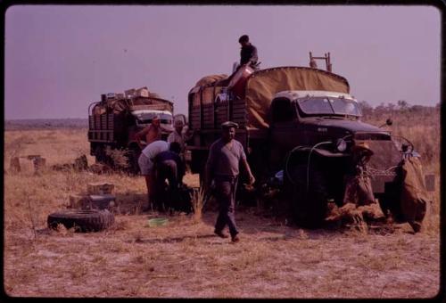 Expedition members unloading the expedition trucks