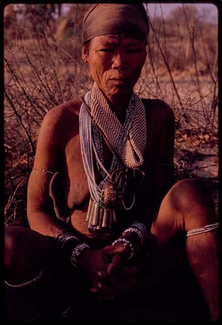 Woman, ǂToma's older wife, sitting