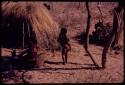 Women and children sitting in the shade