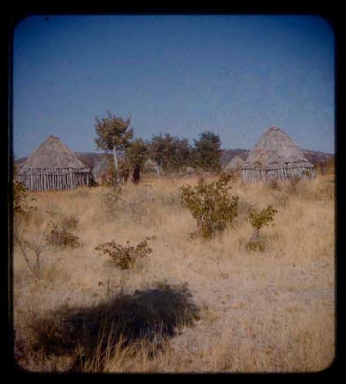 Storage huts, in the distance