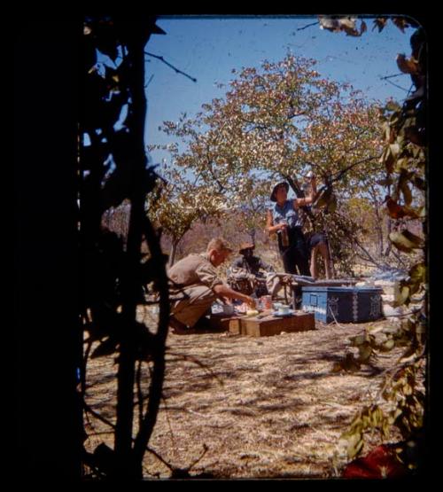 John Marshall, Elizabeth Marshall Thomas, and other expedition members cooking at camp