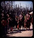 Women and children standing in a line