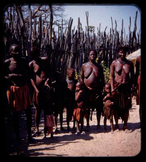 Women and children standing in a line