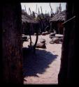 Pots in a kraal seen through gate