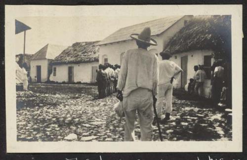 The town crier and his escort, Flores