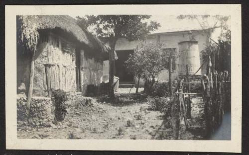 Our backyard: view of kitchen and water tank, Flores