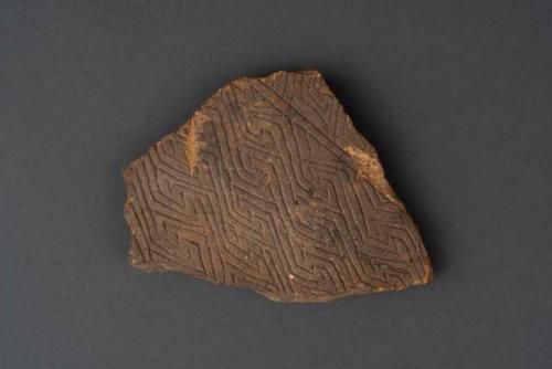 Earthenware body sherd with incised designs