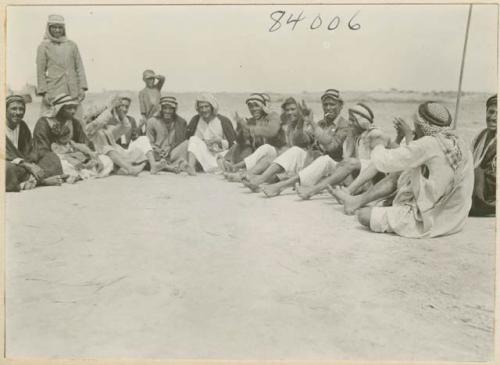 Group portrait of Marsh Arab men and children from the Khazal area